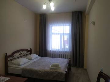 Фото номера Cемейный номер с собственной ванной комнатой Отель Europa Hotel г. Уральск 3