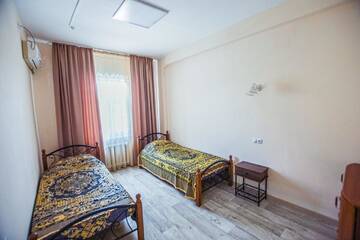 Фото номера Двухместный номер с 2 отдельными кроватями Отель Europa Hotel г. Уральск 2